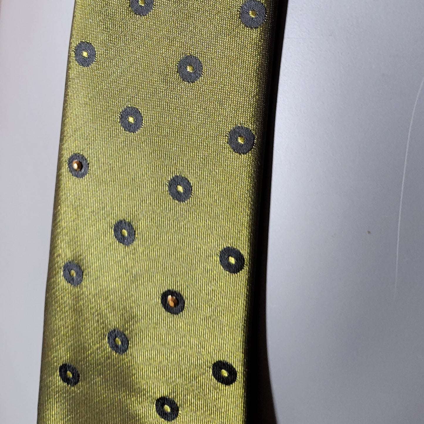 Another Dance collection: All Along the Watchtower tie, retro slim late original 60's early 70's synthetic necktie in a green shade with darker circles adorned with shimmering golden glass crystals
