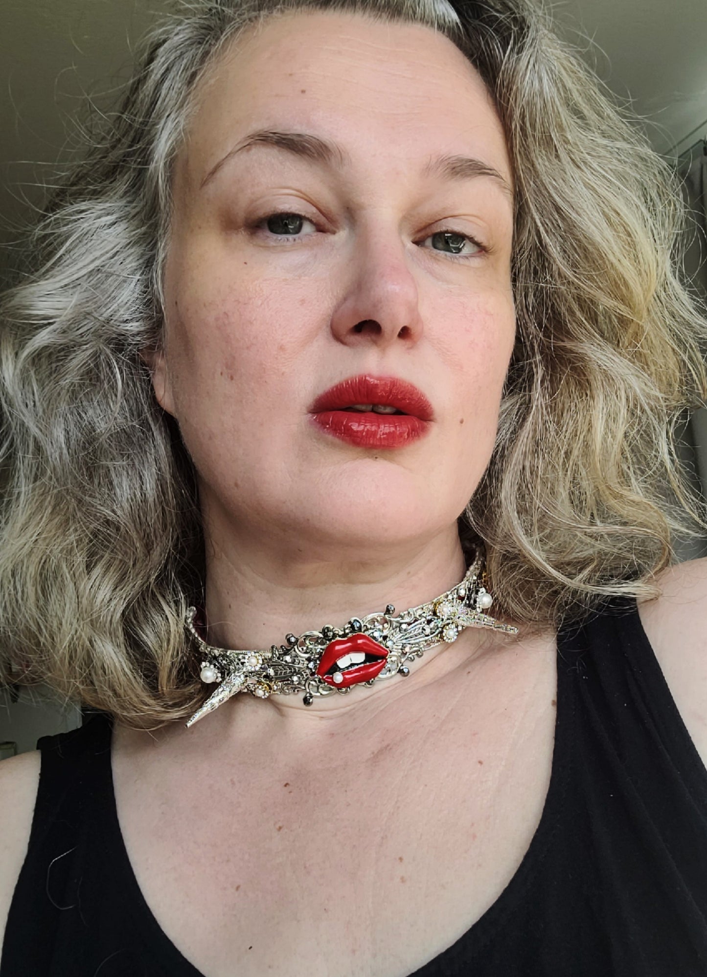 WhatEver collection: The Bite Me metal choker with red enamel lips adorned with a single pearl, two filigree spikes, faux pearls, rhinestones and high quality glass crystals