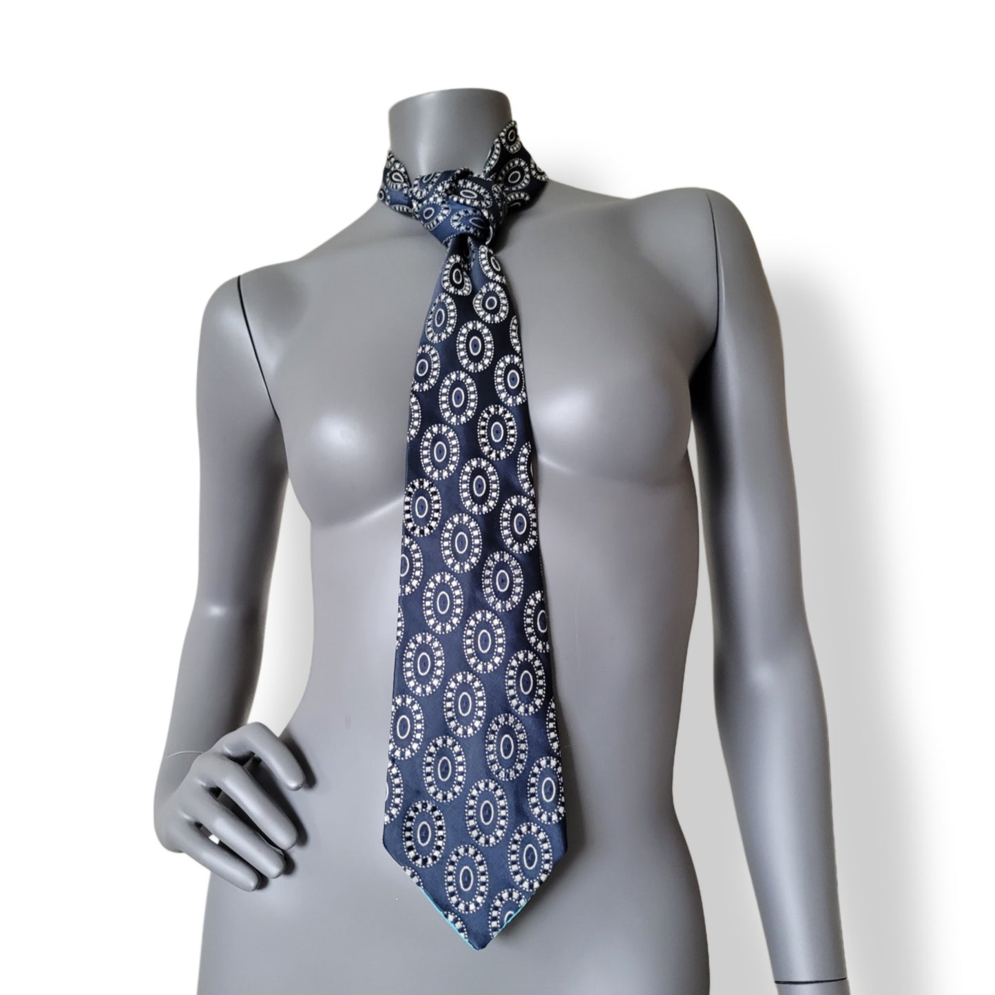 Another Dance collection: Gossip tie, dark navy necktie with white medallion pattern adorned with crystal clear and jet black glass crystals
