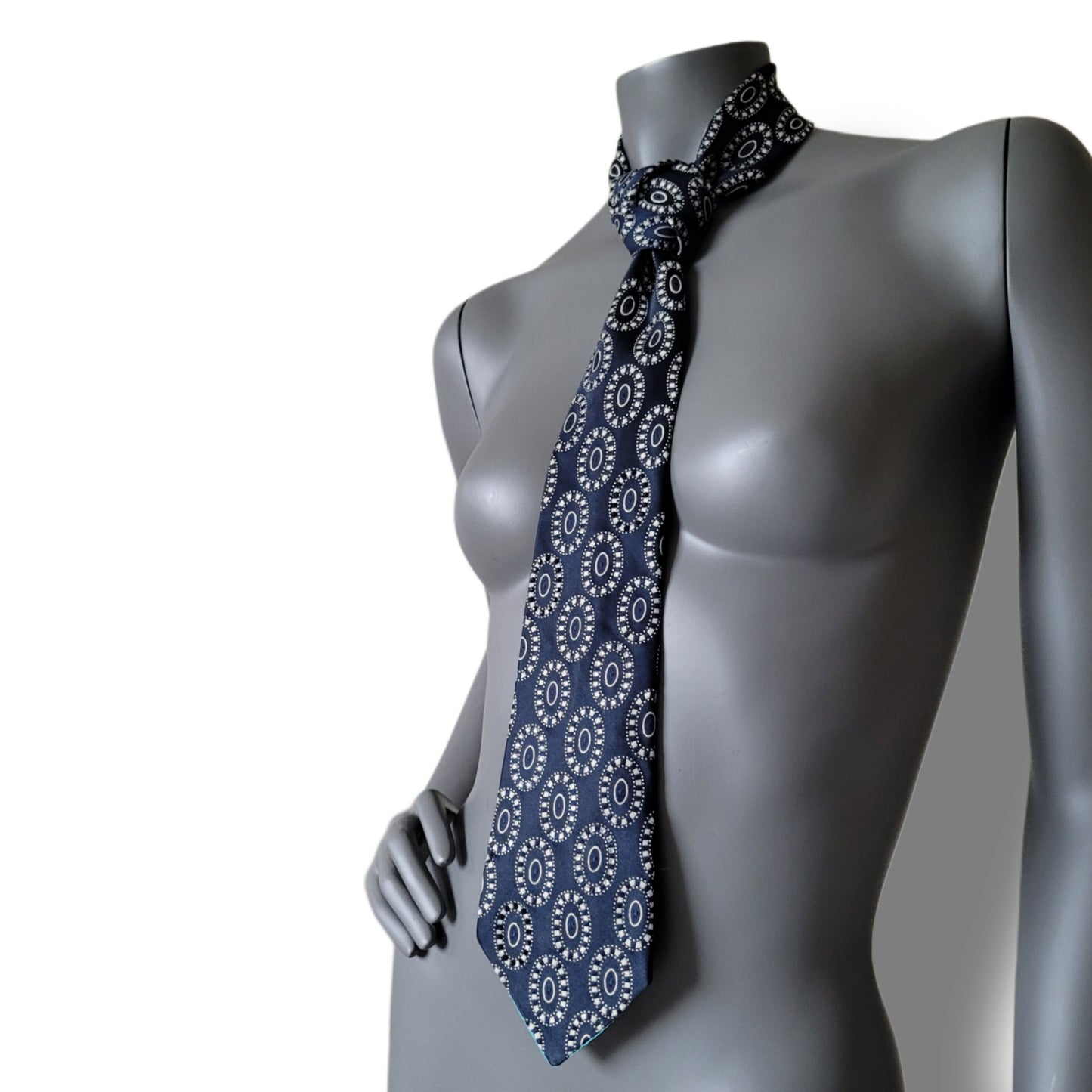 Another Dance collection: Gossip tie, dark navy necktie with white medallion pattern adorned with crystal clear and jet black glass crystals