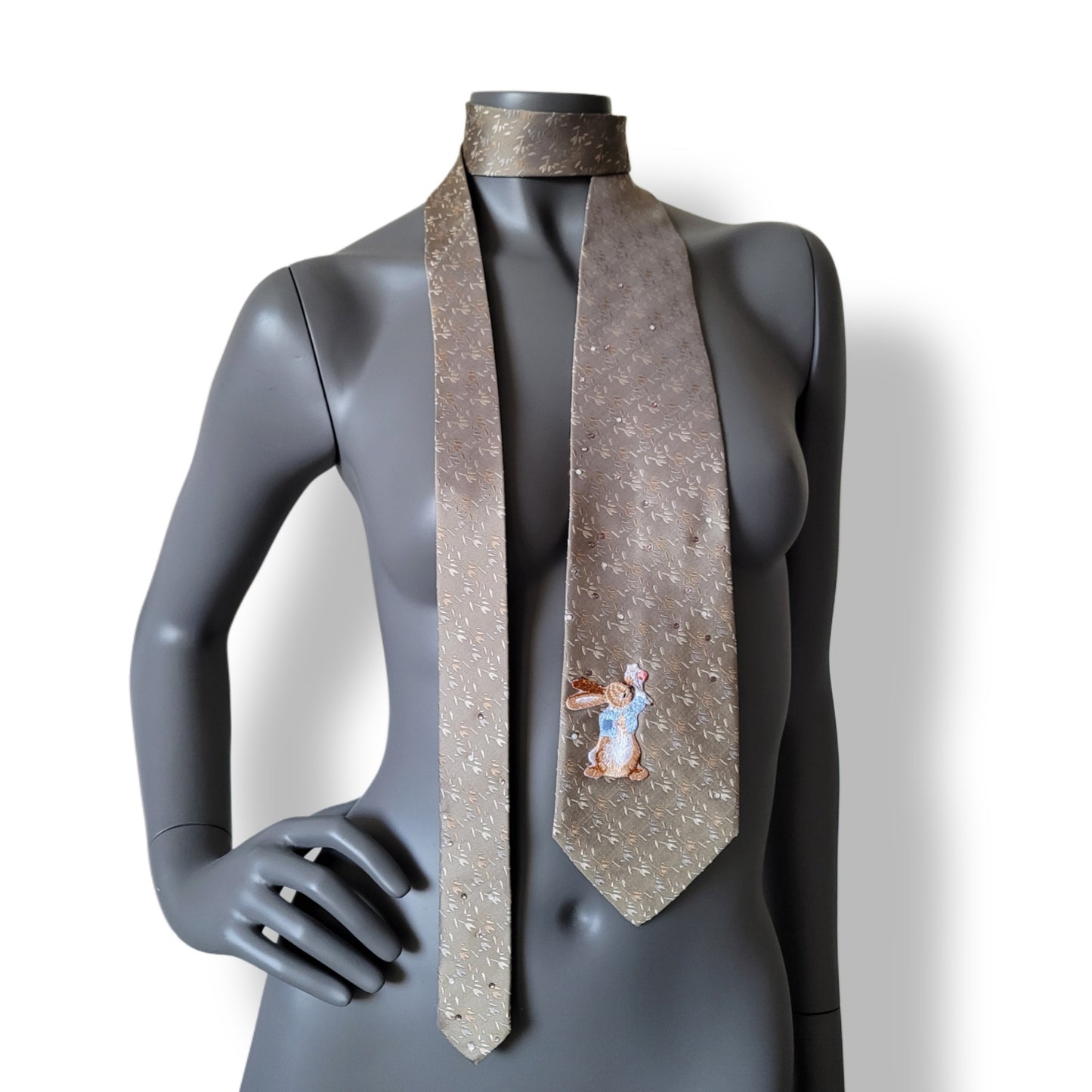 Pastel Bunnies collection, Easter 2025 edition: Pastel Bunny 3 tie, vintage light grayish brown or dark beige pure silk necktie with floral print, shimmering glass crystals and a bunny applique