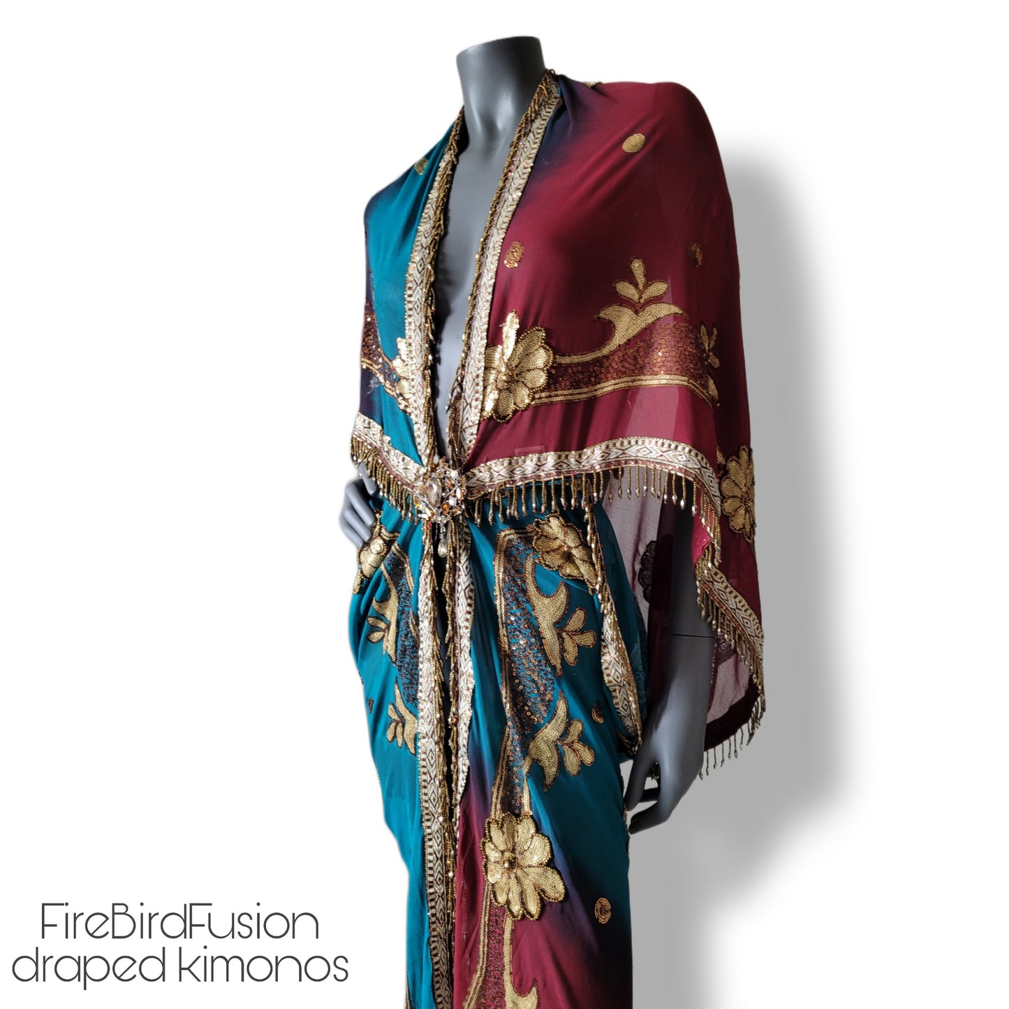Draped kimono in peacock blue and wine red with elaborated embrodery and beaded trim (L)