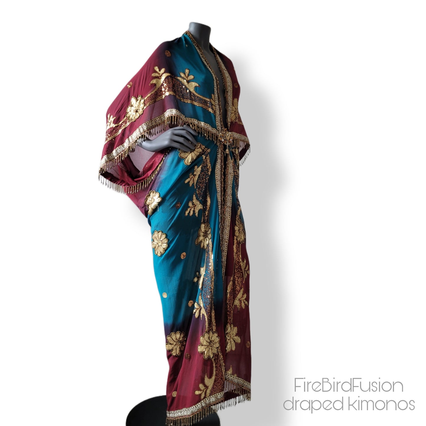 Draped kimono in peacock blue and wine red with elaborated embrodery and beaded trim (L)
