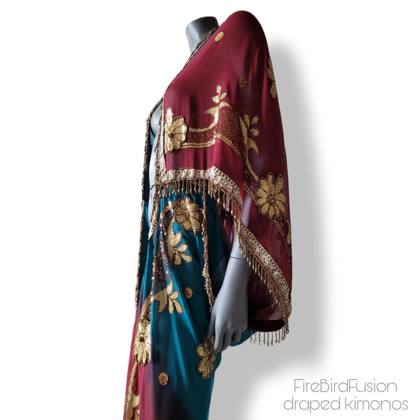 Draped kimono in peacock blue and wine red with elaborated embrodery and beaded trim (L)