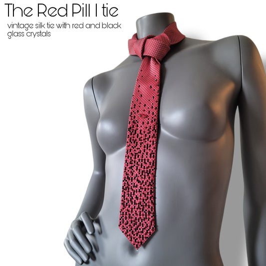 Depth of the Rabbit Hole collection: Red Pill I tie, Matrix inspired necktie with one large red crystal and smaller black glass crystals