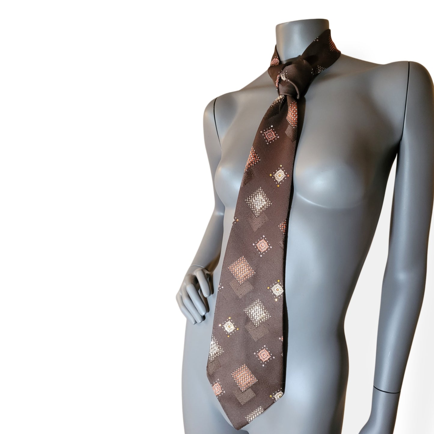 Another Dance collection: Space Oddity tie, original 70's retro brown polyester necktie with diamond shaped pattern in brown and orange, adorned with shimmering glass crystals in matching shades