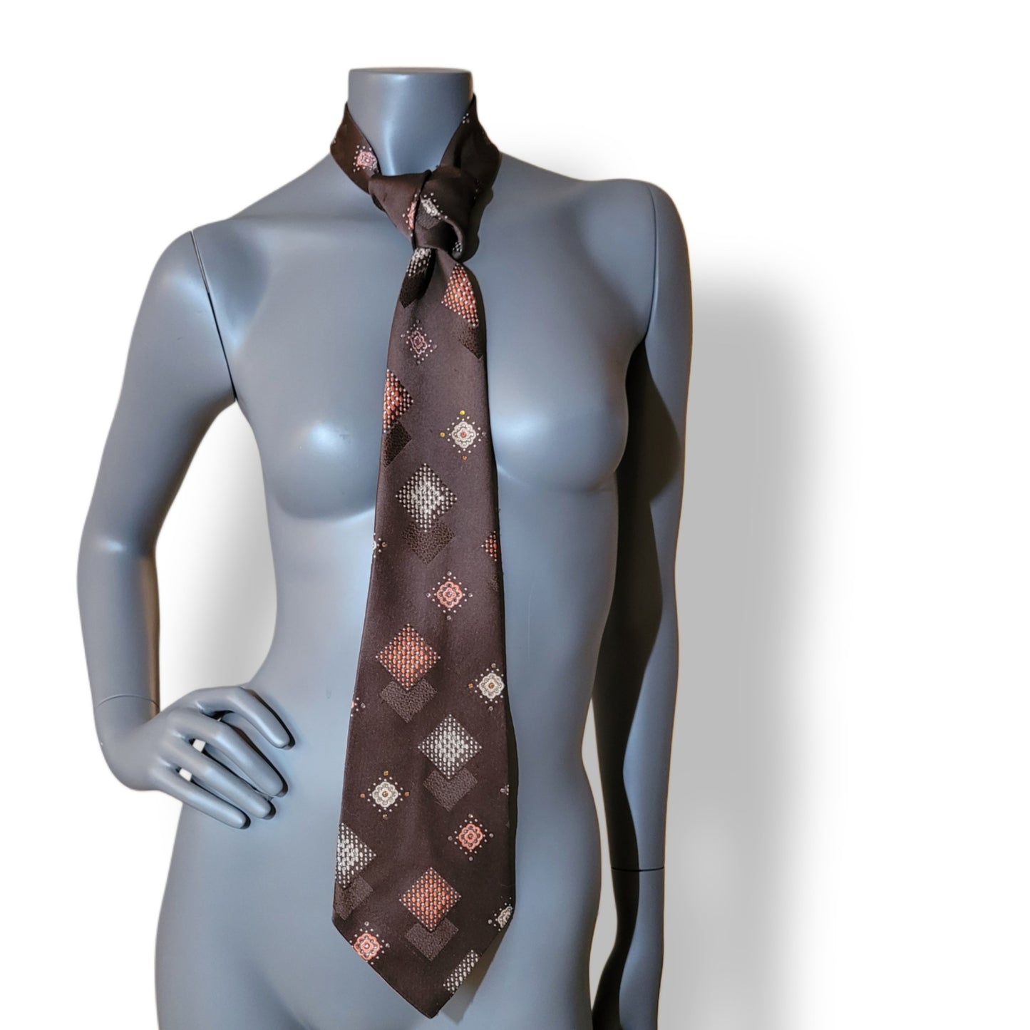Another Dance collection: Space Oddity tie, original 70's retro brown polyester necktie with diamond shaped pattern in brown and orange, adorned with shimmering glass crystals in matching shades