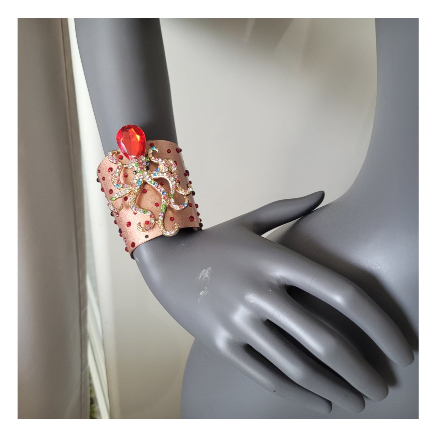 WhatEver collection: The Squeeze Me Tight copper bracelet, adorned with sparkling glass crystals in red and purple, and a crystal encrusted octopus. From the 2018's OG WhatEver collection ❤️🔥