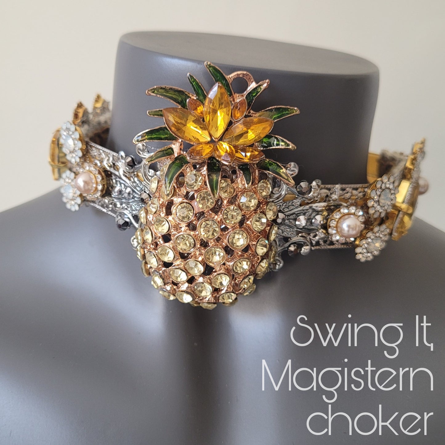 WhatEver collection: The Swing it, Magistern, reversable metal choker with a pineapple, glass crystals, and faux pearls. Can be worn both ways.