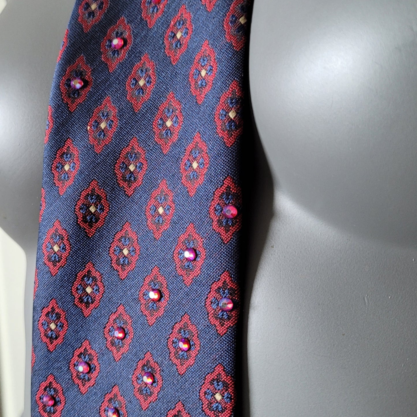 Another Dance collection: Sympathy for the Devil tie, retro marine blue and red polyester necktie with medallion pattern adorned with glass crystals shifting in red and blue