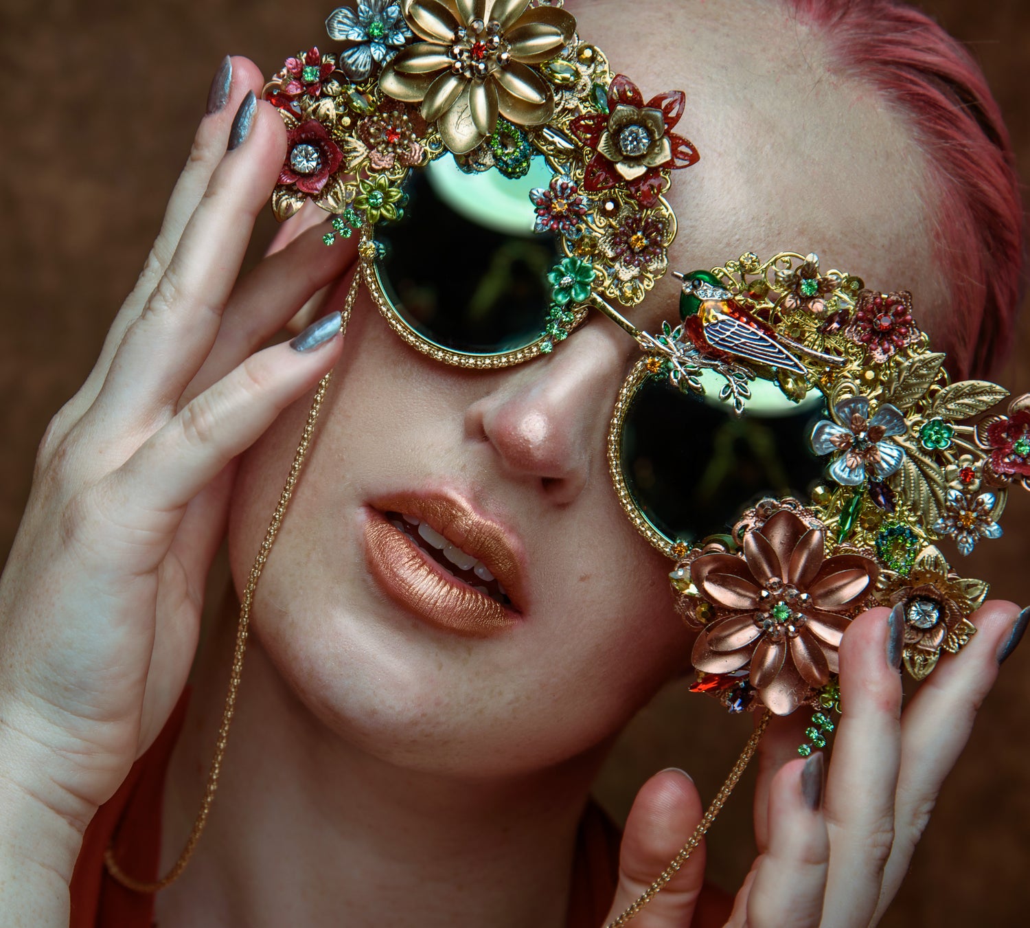 The Early Bird sunglasses by wearable art designer Viveka Gren. Photographed by Sanne Verheij van Bergenhenegouwen. Model Elena Lovebite is wearing a FireBirdFusion kimono.