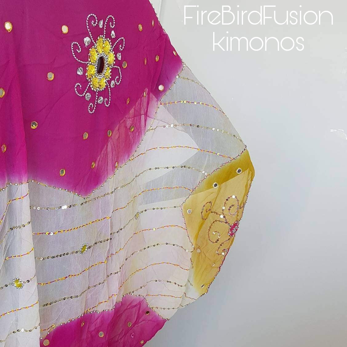Draped kimono in bright pink, yellow & white with mirrors, cut outs and hand embroidery (M)