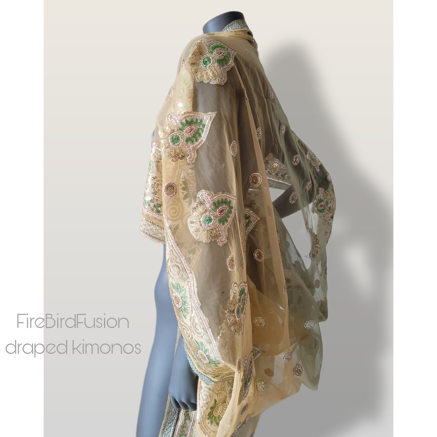 Draped short kimono in light yellow & ivory synthetic net fabric with beautiful embrodery and broad trims (M)