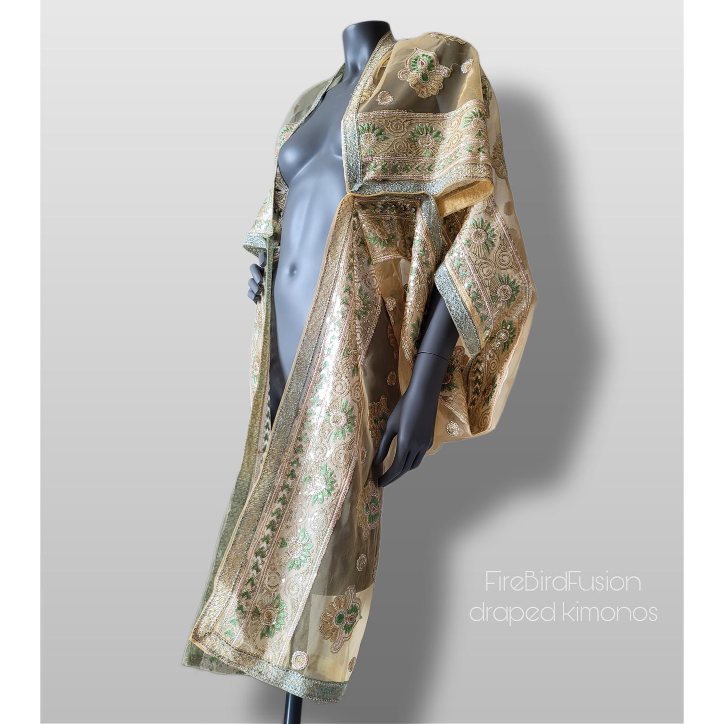 Draped short kimono in light yellow & ivory synthetic net fabric with beautiful embrodery and broad trims (M)