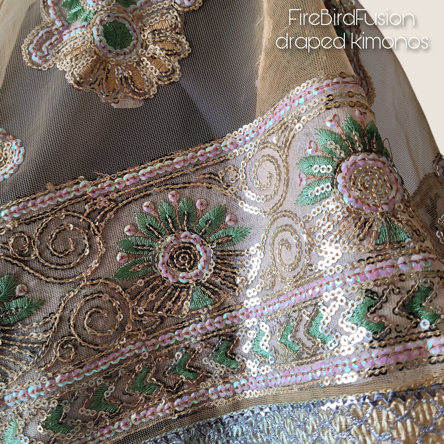 Draped short kimono in light yellow & ivory synthetic net fabric with beautiful embrodery and broad trims (M)