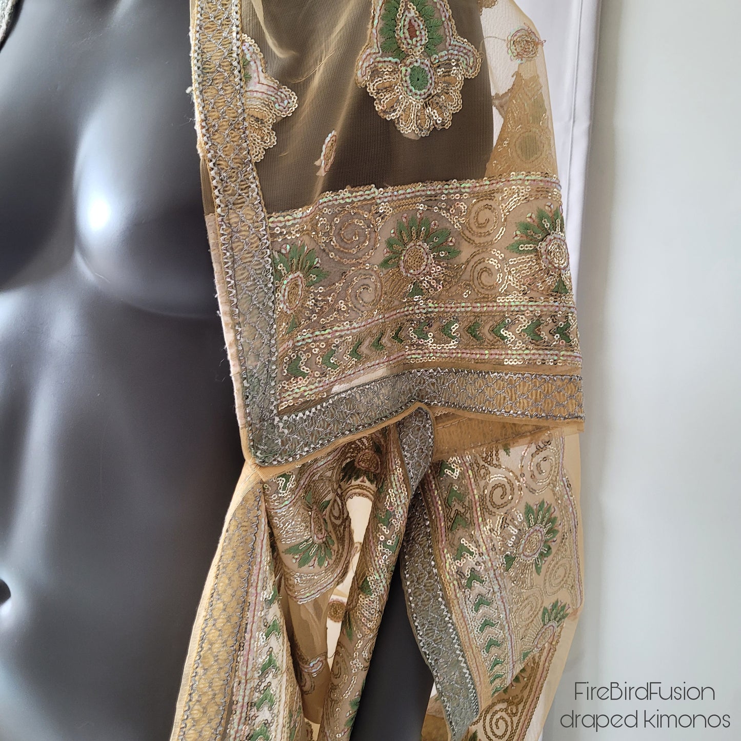 Draped short kimono in light yellow & ivory synthetic net fabric with beautiful embrodery and broad trims (M)