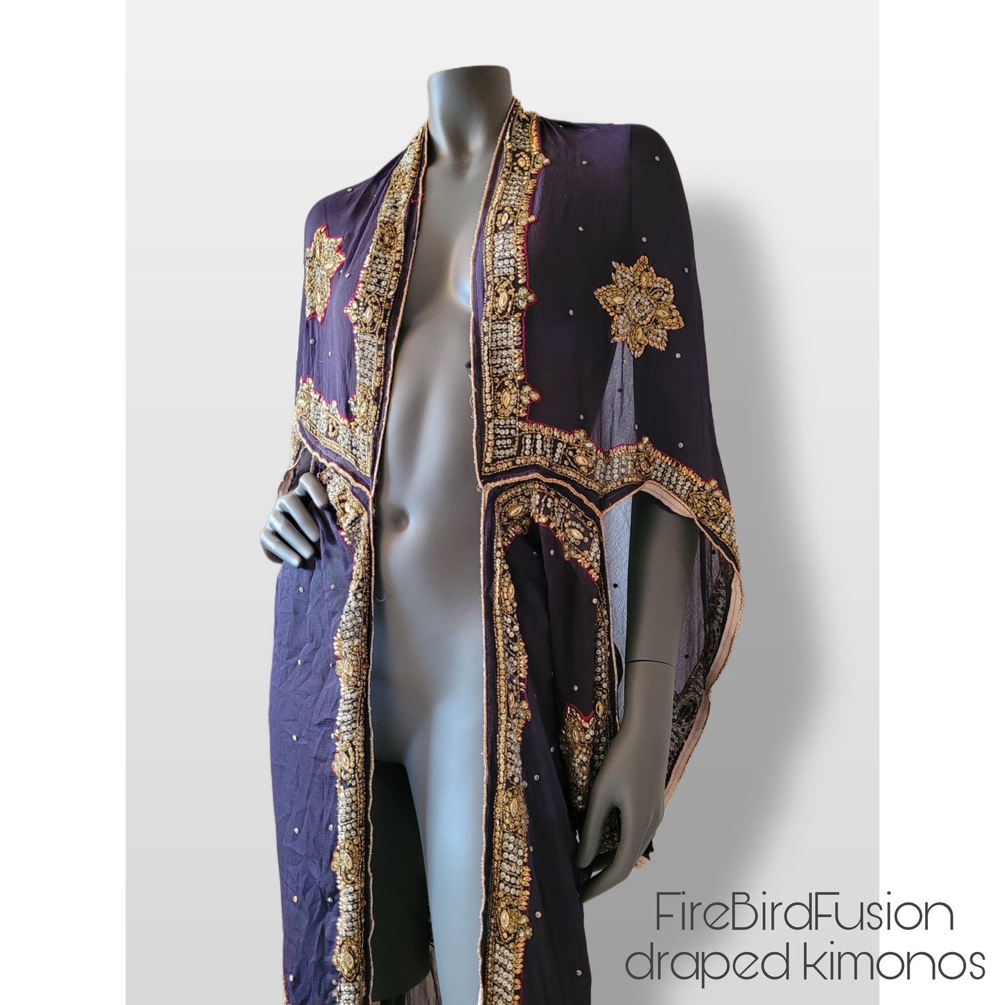 Draped kimono in dark plum with elaborated hand embellishments in gold, silver, red and yellow (L)