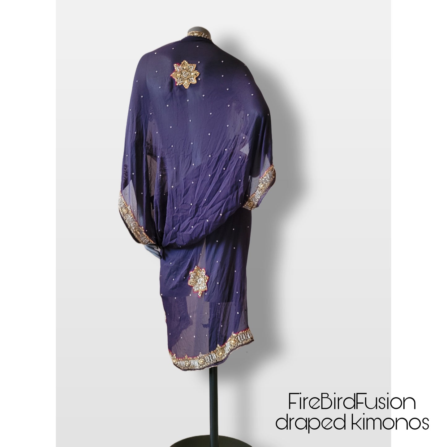 Draped kimono in dark plum with elaborated hand embellishments in gold, silver, red and yellow (L)