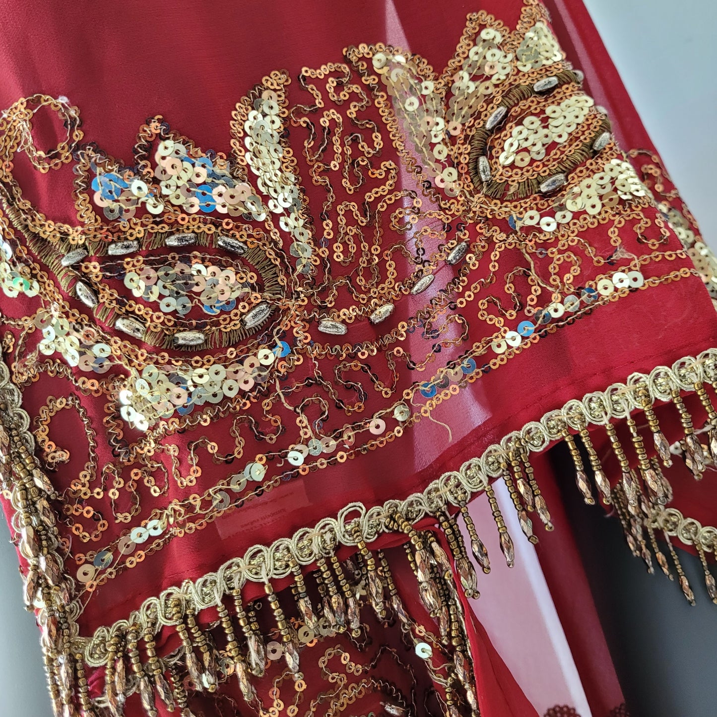 Draped kimono in red with elaborated hand embrodery in gold with beaded fringe (M)