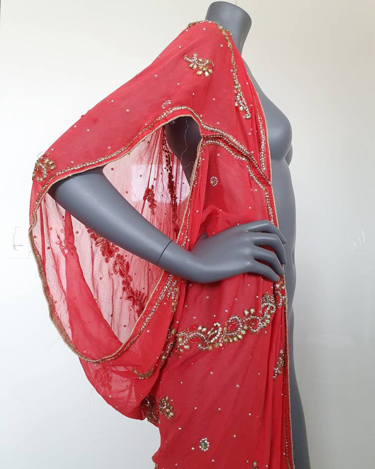 Draped kimono in warm punch with elaborated hand embroidery with irredecent crystals (M)