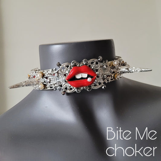 WhatEver collection: The Bite Me metal choker with red enamel lips adorned with a single pearl, two filigree spikes, faux pearls, rhinestones and high quality glass crystals
