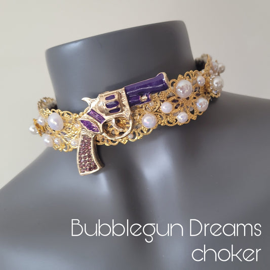 WhatEver collection: The Bubblegun Dreams metal choker with a purple revolver and faux irredecent pearls