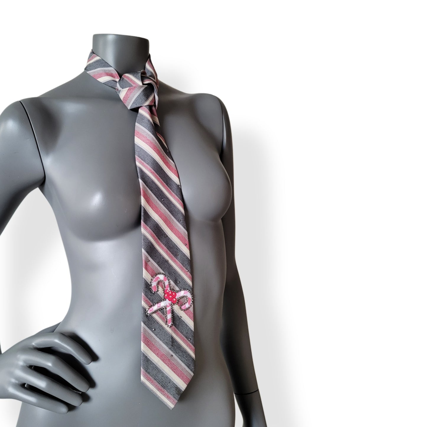 Another Dance collection, Christmas 2025 edition: Candy Cane Lane tie, vintage gray silk & polyester mix necktie with diagonal stripes in pink shades turned into Christmas spirit with pink candy canes and shimmering black diamond glass crystals