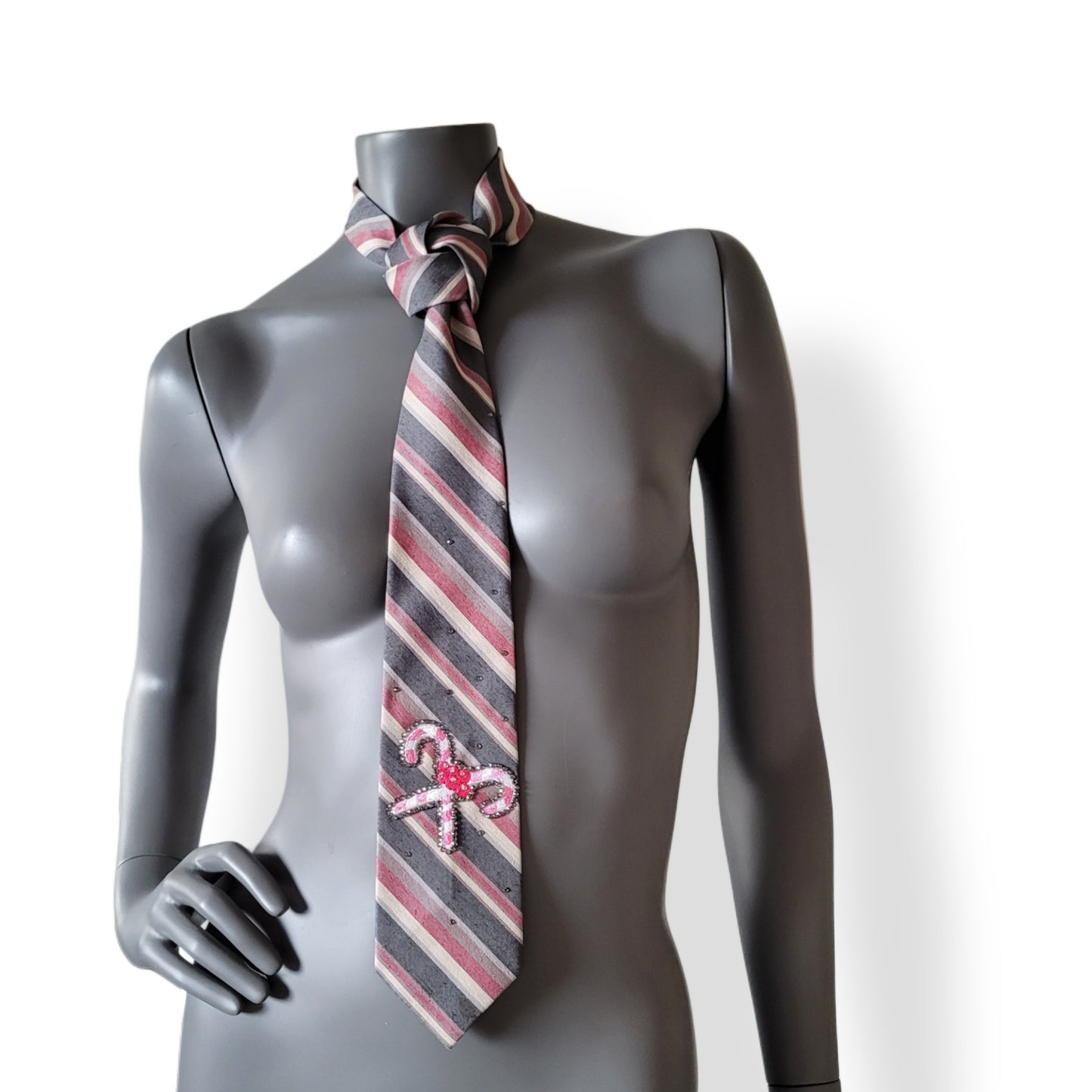 Another Dance collection, Christmas 2025 edition: Candy Cane Lane tie, vintage gray silk & polyester mix necktie with diagonal stripes in pink shades turned into Christmas spirit with pink candy canes and shimmering black diamond glass crystals
