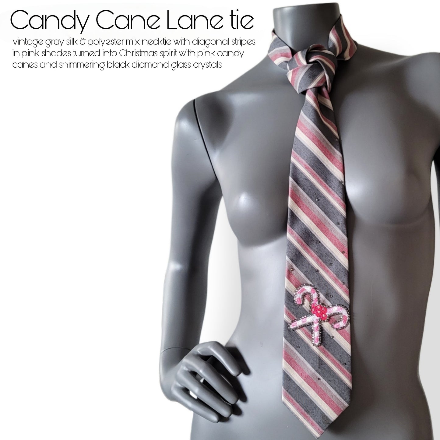 Another Dance collection, Christmas 2025 edition: Candy Cane Lane tie, vintage gray silk & polyester mix necktie with diagonal stripes in pink shades turned into Christmas spirit with pink candy canes and shimmering black diamond glass crystals