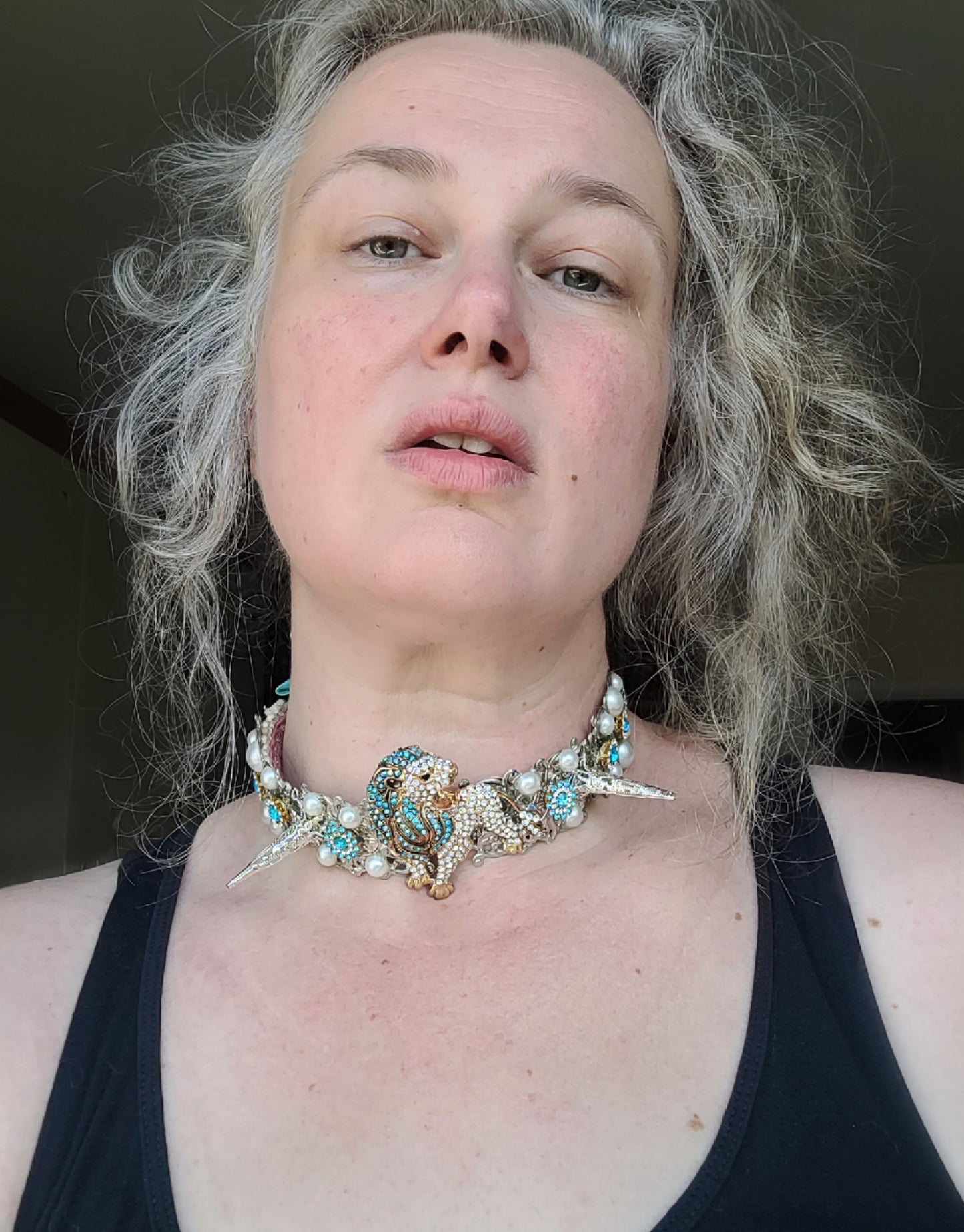 WhatEver collection: The Hear Me Roar metal choker with a crystal encrusted white and blue lion, spikes, faux pearls, rhinestones and glass crystals