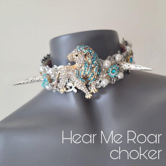WhatEver collection: The Hear Me Roar metal choker with a crystal encrusted white and blue lion, spikes, faux pearls, rhinestones and glass crystals