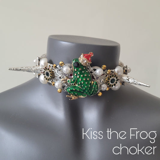 WhatEver collection: The Kiss the Frog metal choker with a crystal encrusted green frog wearing a red and golden royal crown, spikes, faux pearls, rhinestones and glass crystals (update photos before launch)