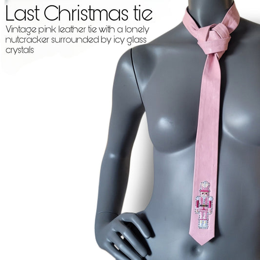 Another Dance collection, Christmas 2025 edition: Last Christmas tie, vintage slim pink necktie in German leather with a lonely nutcracker surrounded by shimmering icy cold glass crystals