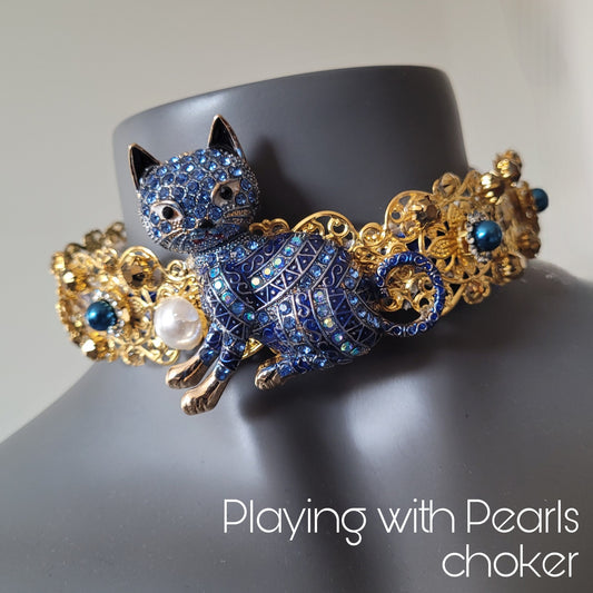 WhatEver collection: The Playing with Pearls metal choker with a blue cat, faux pearls and hight quality glass crystals