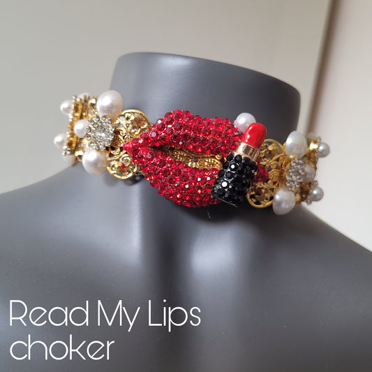 WhatEver collection: The Read My Lips metal choker with red lips, a lipstick, glass crystals and faux pearls
