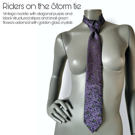 Another Dance collection: Riders on the Storm tie, vintage polyester necktie diagonally striped in purple and black with small green flowers adorned with shimmering mine gold glass crystals