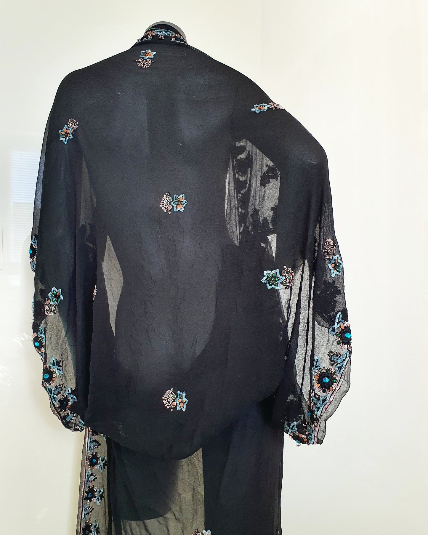 Luxurious draped kimono in silk mix, black with beautiful hand embroidered trim in gold and blue (M-L)