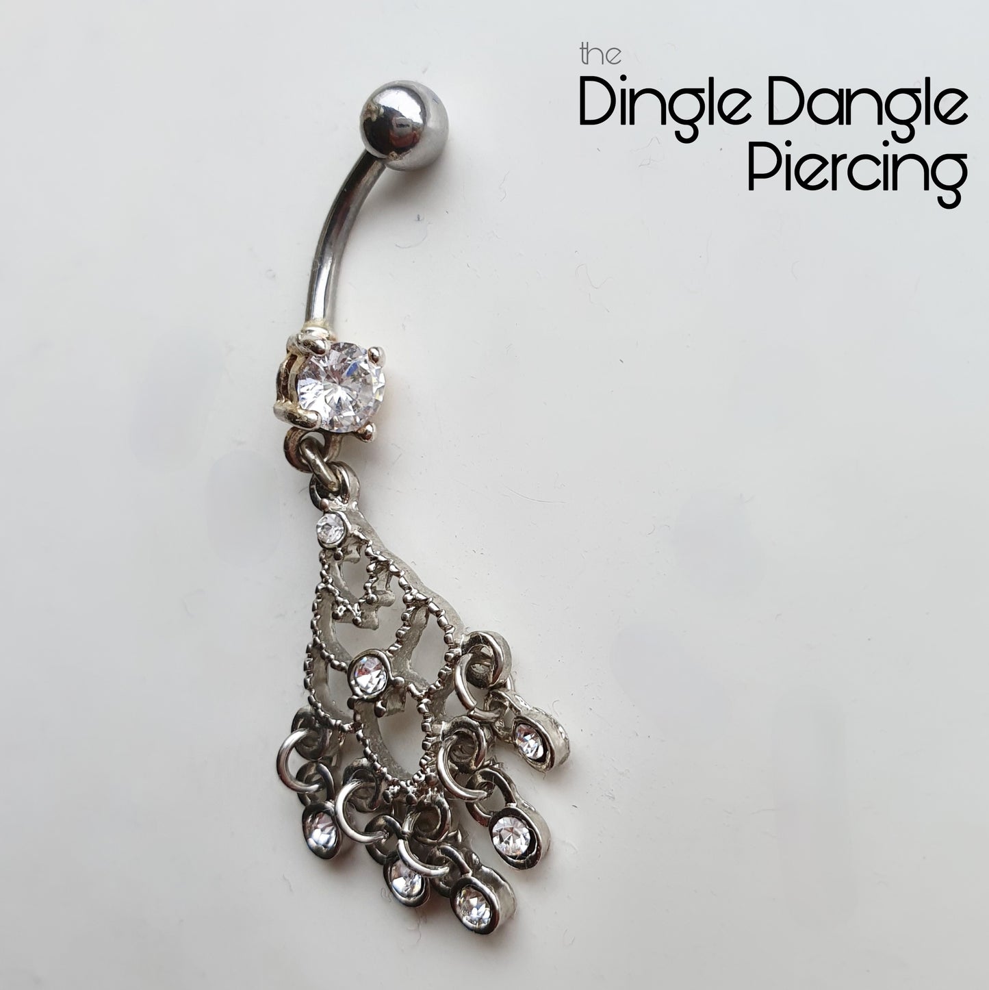 Hidden Centerpiece mini collection: The Dingle Dangle piercing