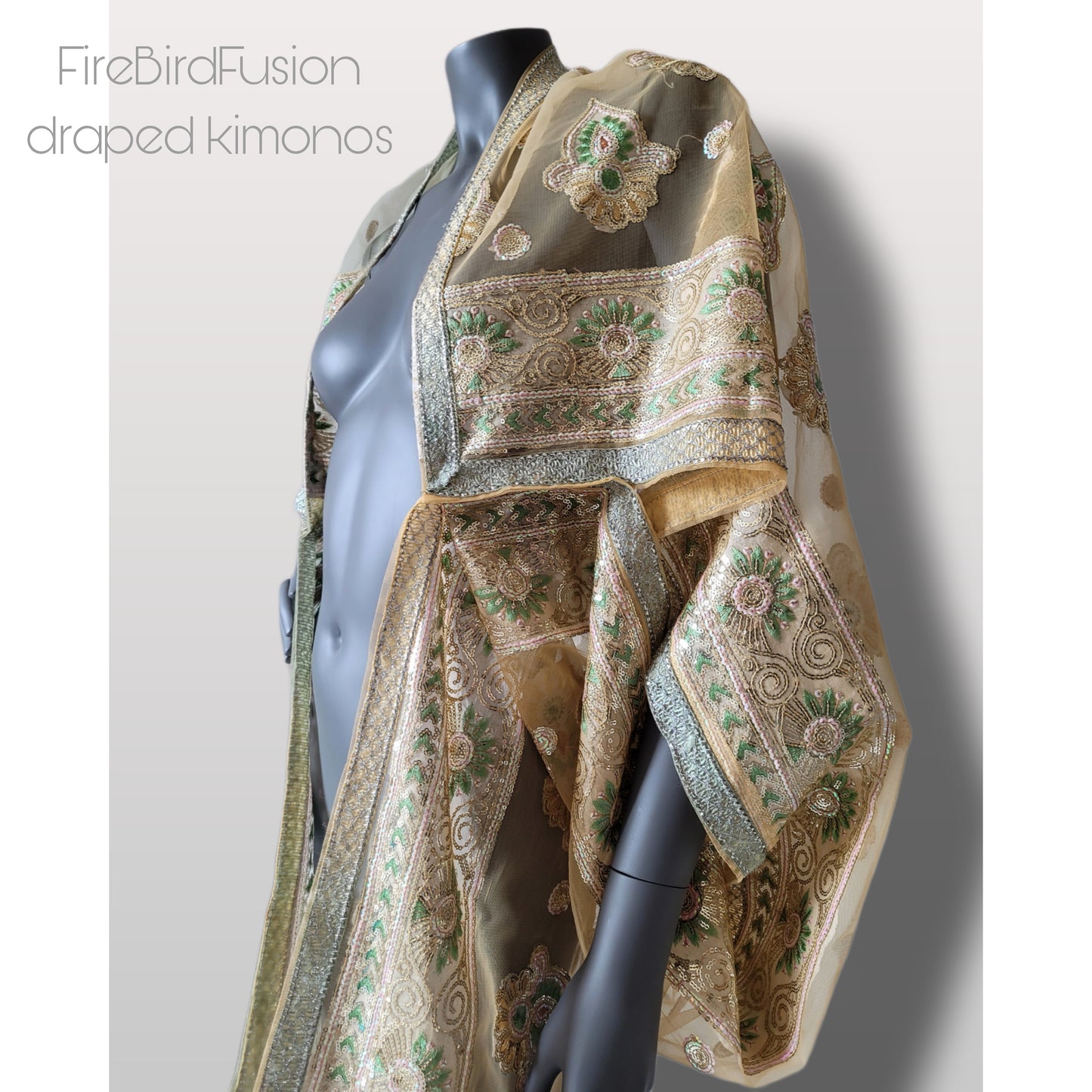 Draped short kimono in light yellow & ivory synthetic net fabric with beautiful embrodery and broad trims (M)