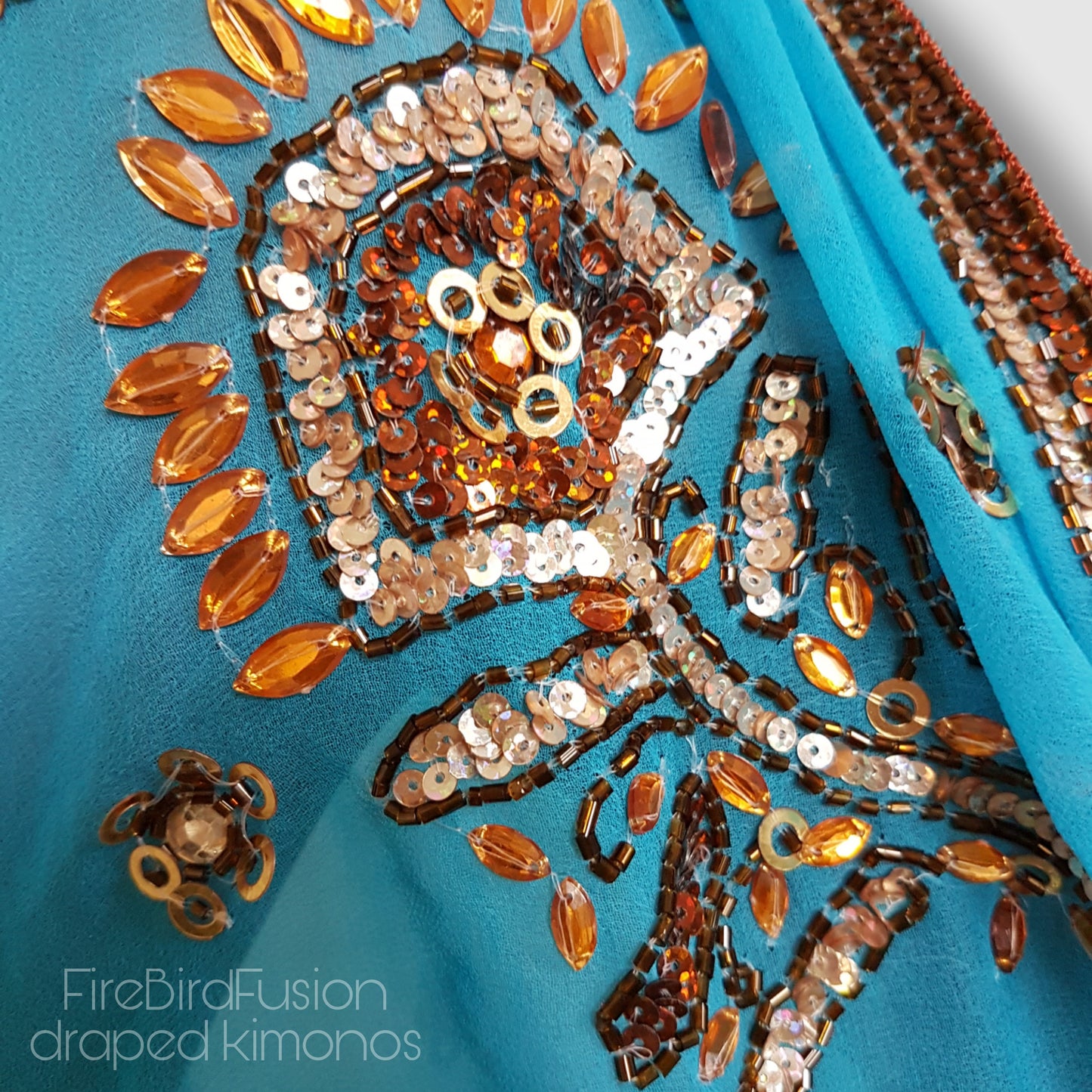 Draped kimono in bright blue with bold bronze embroidery (M)