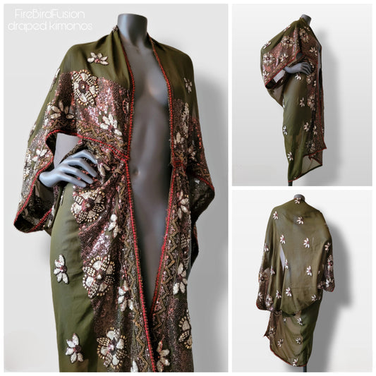 Draped kimono in light olive green with golden shine and broad embroidered trim in wine red, silver and bronze (M-L)