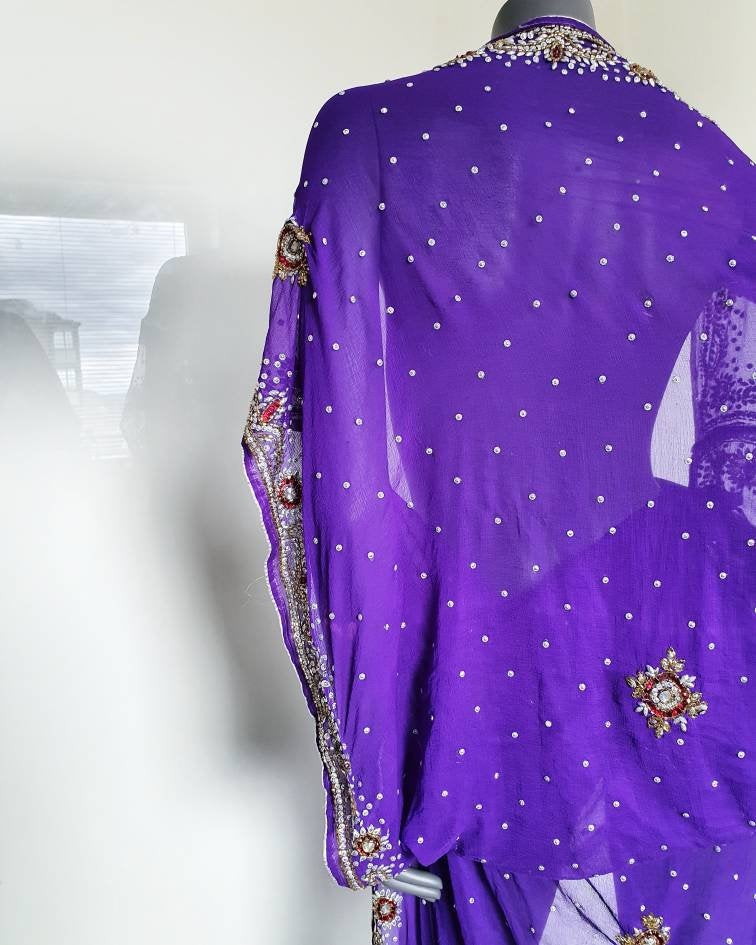 Draped kimono in bright purple with elaborated hand embellishments in white, red and yellow (M)